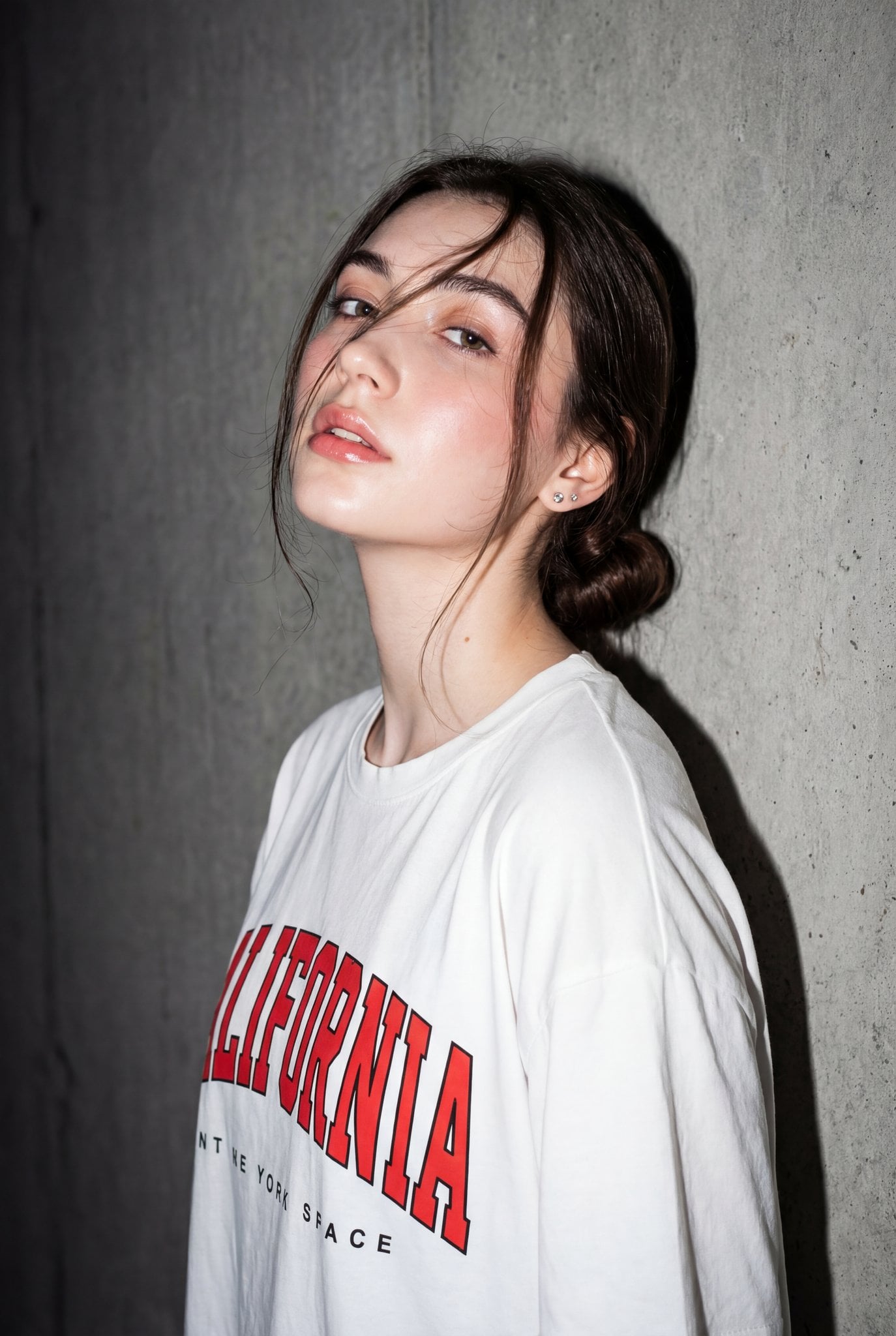 A high-resolution, close-up editorial-style portrait of a young woman standing against a ...