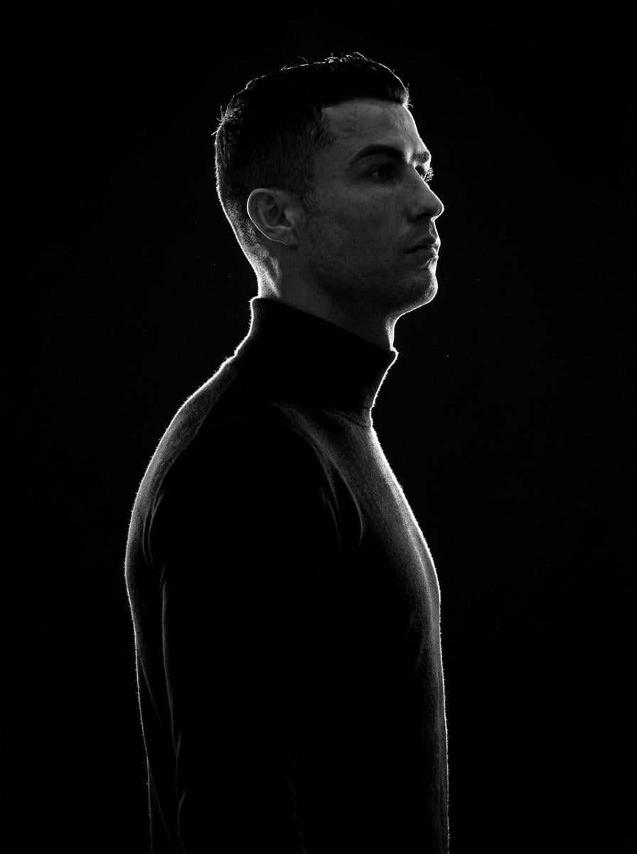 A minimalist black and white cinematic portrait featuring two individuals (male and femal...
